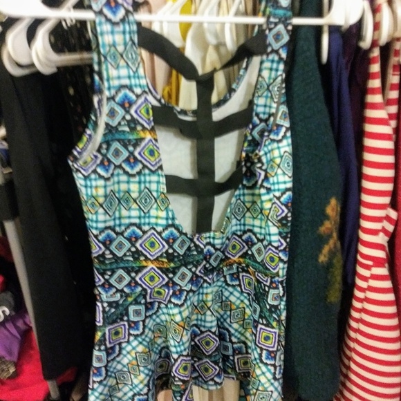 Sleeveless Peplum Top - Picture 2 of 3